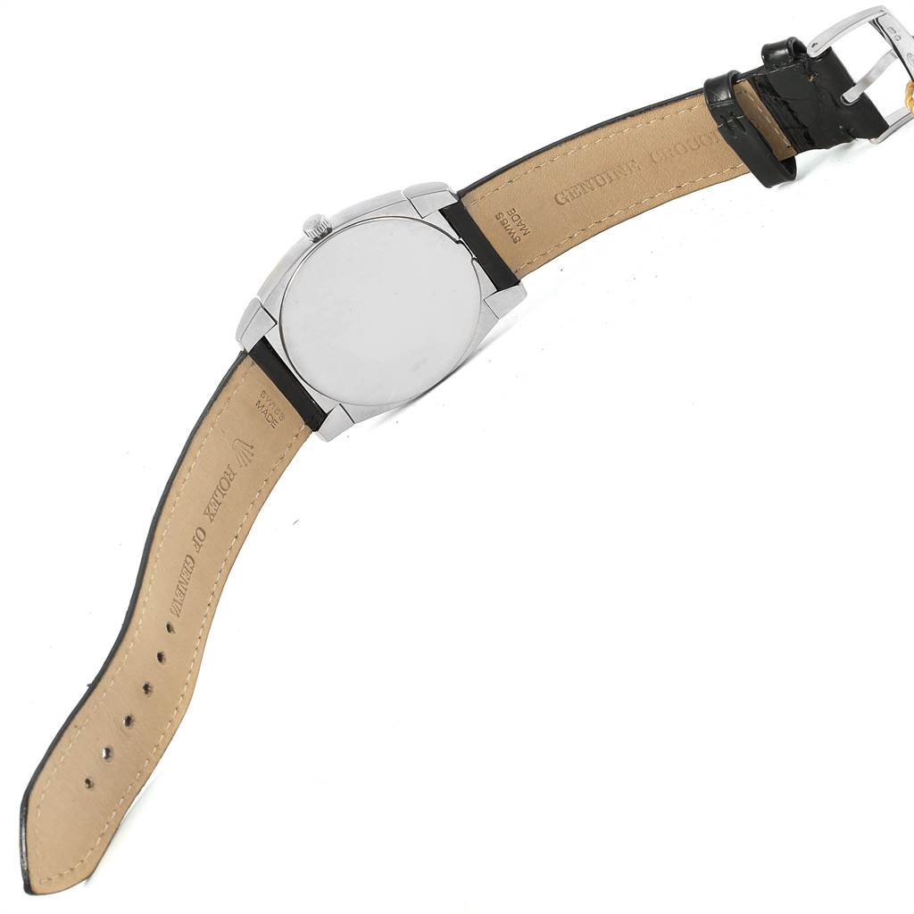 The image shows the back of a Rolex Cellini 5330 Men
s White Gold White Dial 5330 Men
s White Gold White Dial watch with an open, black leather strap displayed flat.