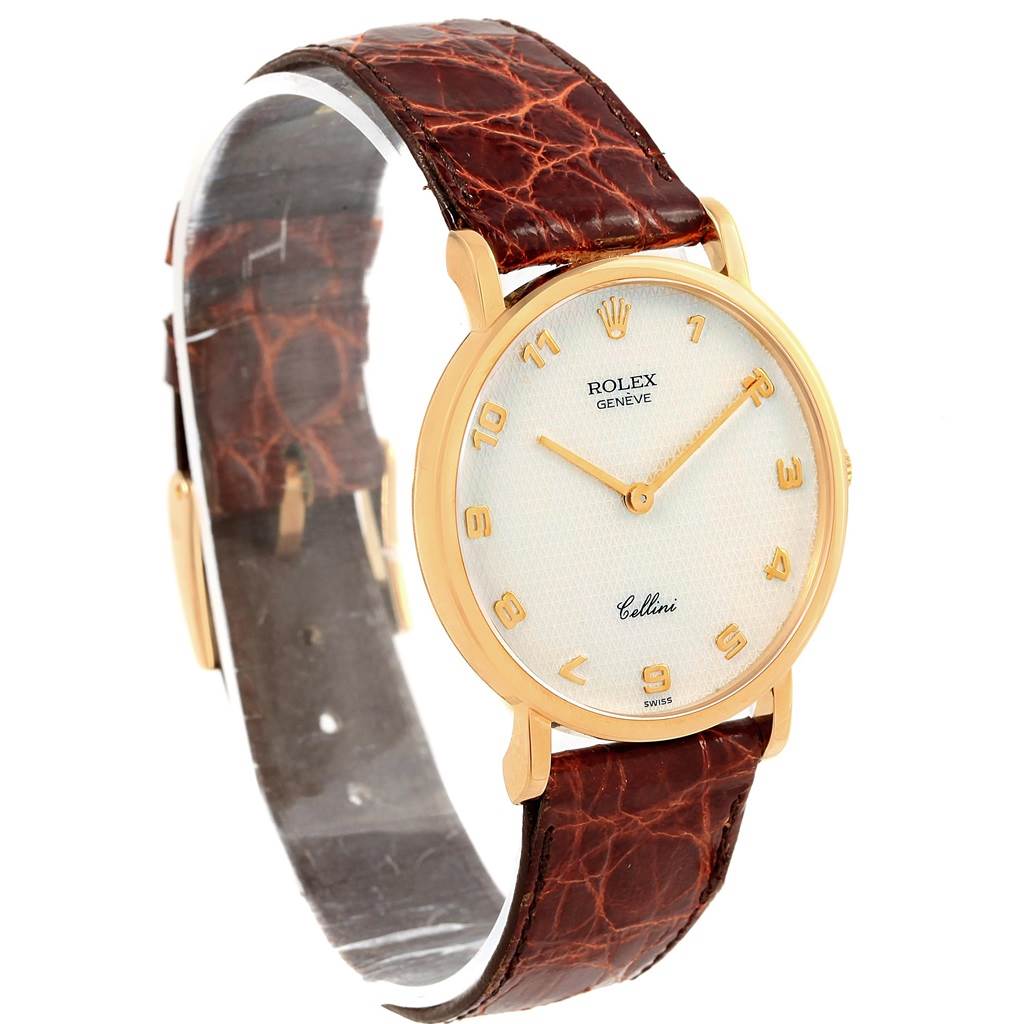 The Rolex Cellini 5112 Yellow Gold Mother of Pearl Dial 5112 Yellow Gold Mother of Pearl Dial watch is shown at a slight angle, displaying its white dial, gold case, and brown leather strap.