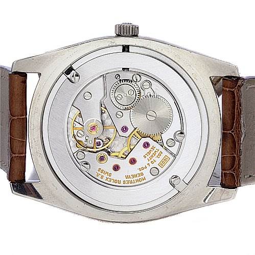 The image shows the back of a Rolex Cellini 4233 White Gold Black Dial 4233 White Gold Black Dial watch, revealing its intricate internal mechanisms.