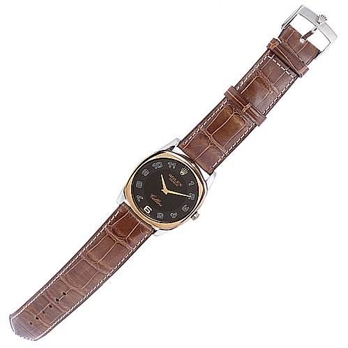 The image shows a Rolex Cellini 4233 White Gold Black Dial 4233 White Gold Black Dial watch from a top-down view, displaying the face, brown leather strap, and metal buckle clasp.