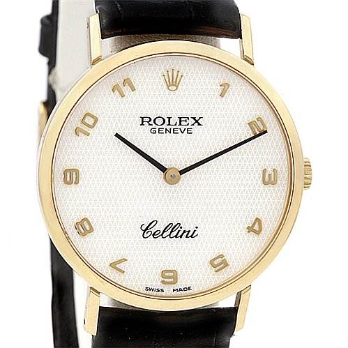 The image shows a front view of a Rolex Cellini 4112 Yellow Gold Mother of Pearl Dial 4112 Yellow Gold Mother of Pearl Dial watch, highlighting its gold case, white dial, black leather strap, and gold numerals.