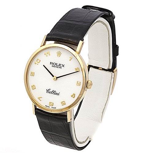 The Rolex Cellini 4112 Yellow Gold Mother of Pearl Dial 4112 Yellow Gold Mother of Pearl Dial watch is shown in a three-quarter angle, displaying its round dial, leather strap, and gold bezel.