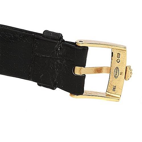 The image shows the gold buckle and part of the black leather strap of a Rolex Cellini 4112 Yellow Gold Mother of Pearl Dial 4112 Yellow Gold Mother of Pearl Dial watch, viewed from the side.