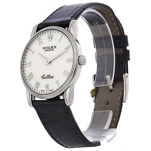 The image shows a side view of a Rolex Cellini 5116/9 White Gold Beige Dial 5116/9 White Gold Beige Dial watch, highlighting its face, case, crown, and leather strap.
