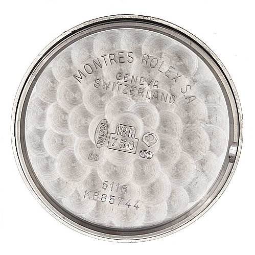 This image shows the inside case back of a Rolex Cellini 5116/9 White Gold Beige Dial 5116/9 White Gold Beige Dial watch, displaying brand engravings and gold purity markings.