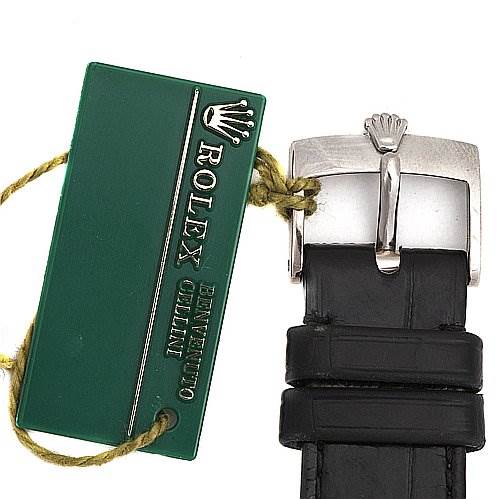 The image shows the buckle and strap of a Rolex Cellini 5116/9 White Gold Beige Dial 5116/9 White Gold Beige Dial watch, along with the brand's green tag.