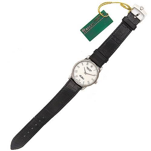 The image shows a full view of a Rolex Cellini 5116/9 White Gold Beige Dial 5116/9 White Gold Beige Dial watch, including its white dial, black leather strap, buckle, and a green Rolex tag.