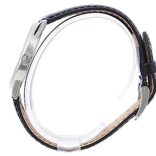 The image shows a side profile of the Rolex Cellini 5116/9 White Gold Black Dial 5116/9 White Gold Black Dial watch, highlighting its crown and leather strap.