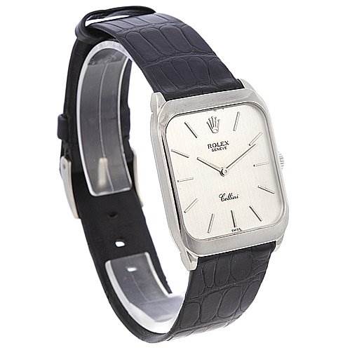 The image shows a Rolex Cellini 4135 White Gold Silver Dial 4135 White Gold Silver Dial watch angled to display the front dial, bezel, and black leather strap.