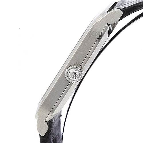 This image shows a side view of a Rolex Cellini 4135 White Gold Silver Dial 4135 White Gold Silver Dial watch, highlighting the crown and the thickness of the case.