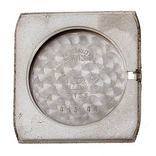 This image shows the inside case back of a Rolex Cellini 4135 White Gold Silver Dial 4135 White Gold Silver Dial watch, featuring brand engravings and material specifications.