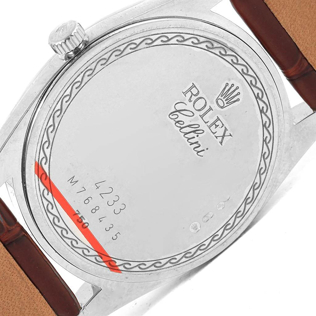 The image shows the back case of a Rolex Cellini 4233 Men's White Gold Black Dial 4233 Men's White Gold Black Dial watch, including the engraved model details and crown.
