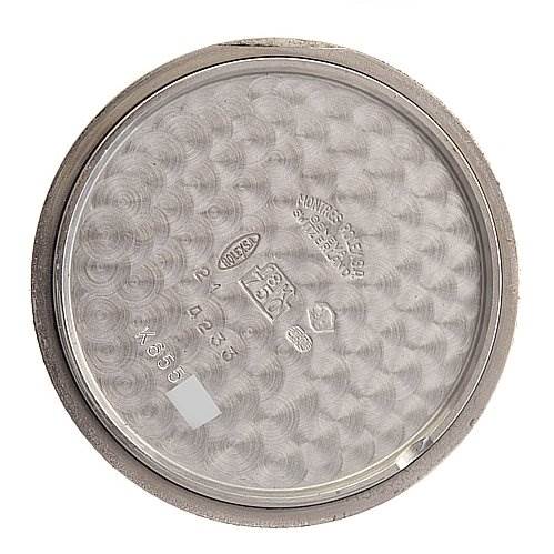 The image shows the inside of the case back of a Rolex Cellini 4233 White Gold Black Dial 4233 White Gold Black Dial watch, viewed from directly above.