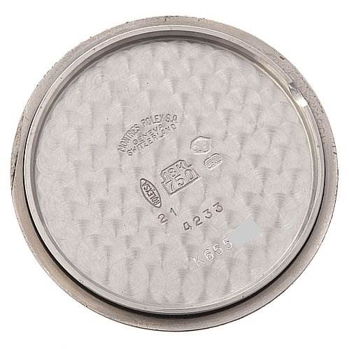 The image shows the inside case back of a Rolex Cellini 4233 White Gold Black Dial 4233 White Gold Black Dial watch, displaying various engraved markings and model numbers.