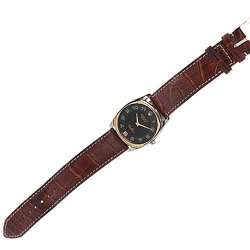 The image shows a top-down view of a Rolex Cellini 4233 White Gold Black Dial 4233 White Gold Black Dial watch with a brown leather strap and a black dial.