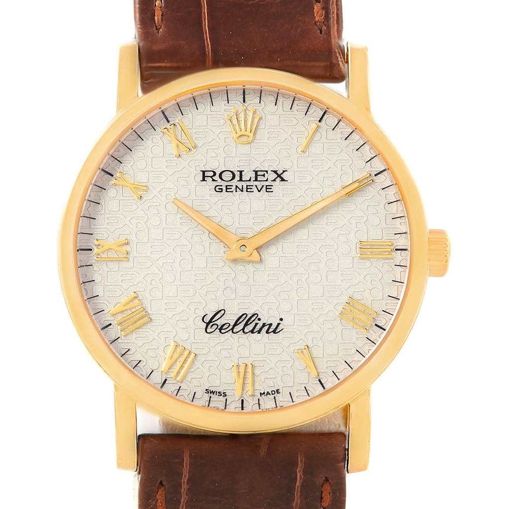 The image shows a frontal view of a Rolex Cellini 5115 Men's Yellow Gold Beige Dial 5115 Men's Yellow Gold Beige Dial watch featuring the dial, gold Roman and bar markers, and a brown leather strap.