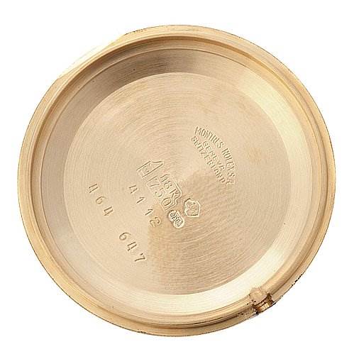 The image shows the inside of the watch case back for the Rolex Cellini 4112 Yellow Gold Champagne Dial 4112 Yellow Gold Champagne Dial model.