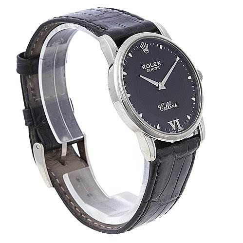 The image shows a Rolex Cellini 5116/9 White Gold Black Dial 5116/9 White Gold Black Dial watch angled to display its black face, silver case, and leather strap.