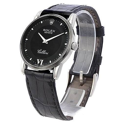 The Rolex Cellini 5116/9 White Gold Black Dial 5116/9 White Gold Black Dial watch is shown at a slight angle, revealing the watch face, bezel, crown, and leather strap.