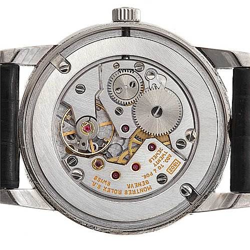 This image shows the back view of the Rolex Cellini 5116/9 White Gold Black Dial 5116/9 White Gold Black Dial watch, highlighting its exposed mechanical movement and inner workings.