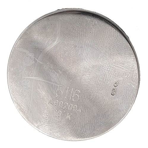 This image shows the inside of the case back for a Rolex Cellini 5116/9 White Gold Black Dial 5116/9 White Gold Black Dial model, featuring the model number and 18K gold marking.