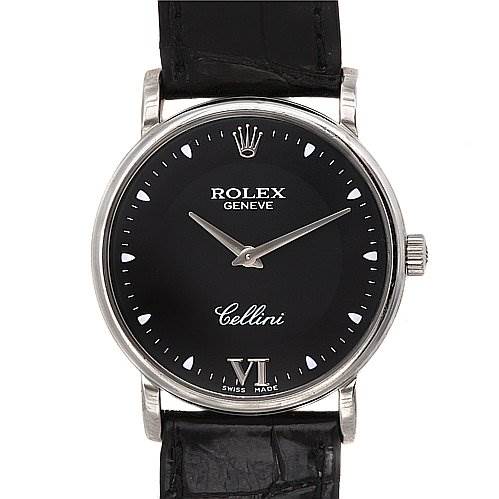 The image shows a front view of a Rolex Cellini 5115/9 White Gold Black Dial 5115/9 White Gold Black Dial watch, displaying its face, crown, and part of the leather strap.