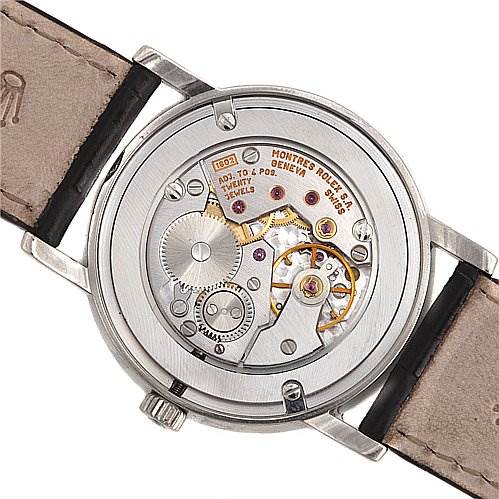 This image shows the back view of a Rolex Cellini 5115/9 White Gold Black Dial 5115/9 White Gold Black Dial watch, revealing the intricate mechanical movement inside.