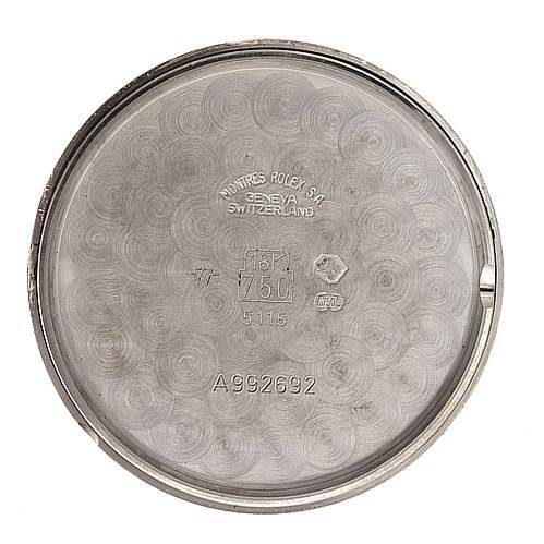 The image shows the inside case back of a Rolex Cellini 5115/9 White Gold Black Dial 5115/9 White Gold Black Dial watch.