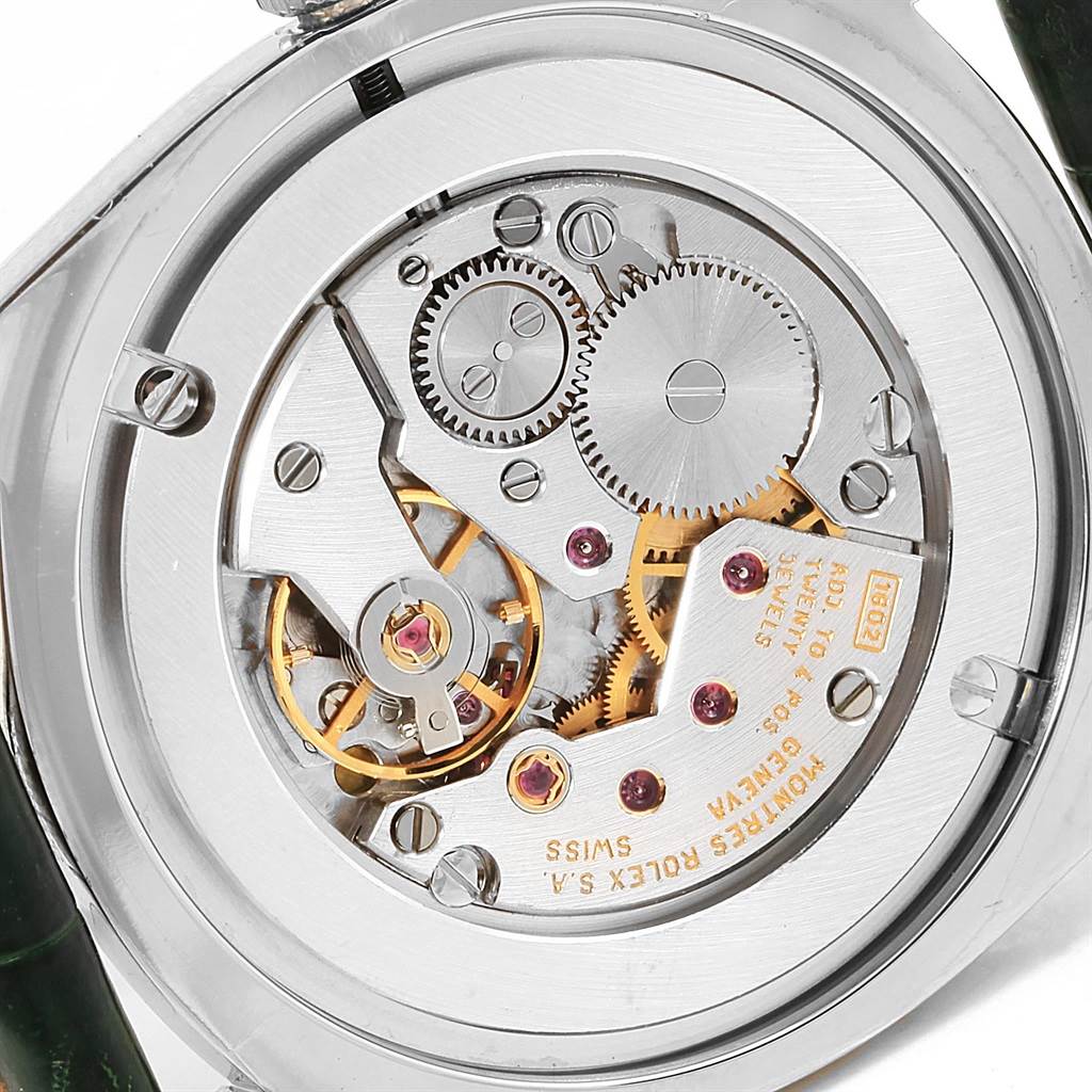 This image shows the back view of a Rolex Cellini 4233 Men's White Gold Black Dial 4233 Men's White Gold Black Dial model, highlighting its intricate mechanical movement.