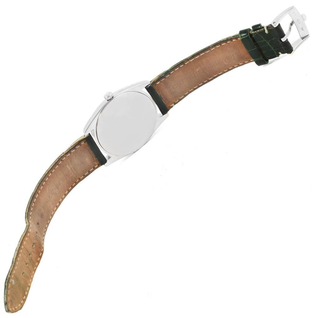 This image shows the back view of a Rolex Cellini 4233 Men's White Gold Black Dial 4233 Men's White Gold Black Dial watch with its leather strap and buckle visible.