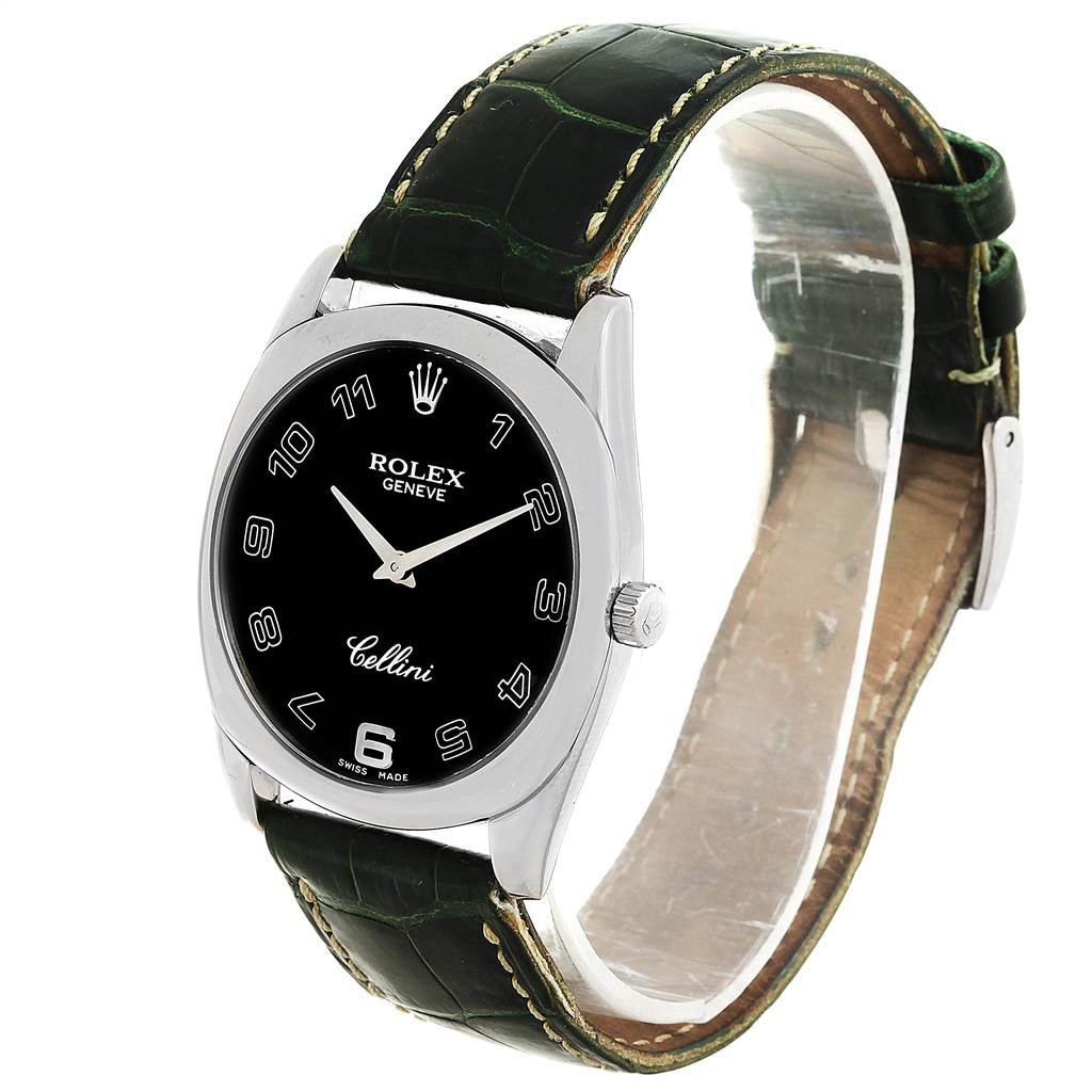 The Rolex Cellini 4233 Men's White Gold Black Dial 4233 Men's White Gold Black Dial watch is shown at an angled front view, highlighting its black dial, silver case, and green leather strap.
