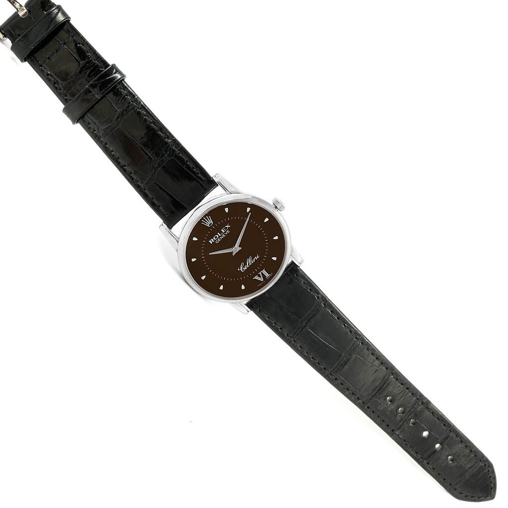 This image shows a top-down view of a Rolex Cellini 5116 Men's White Gold Brown Dial 5116 Men's White Gold Brown Dial watch, displaying its face, case, crown, and leather strap.
