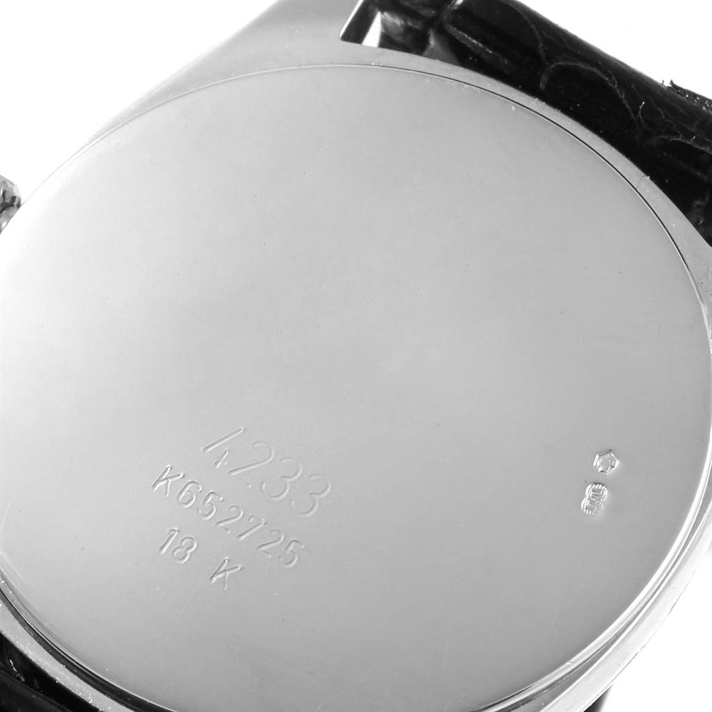 The image shows the back case of a Rolex Cellini 4233 Men's White Gold Black Dial 4233 Men's White Gold Black Dial watch, highlighting model number 4233 and material indication (18K).