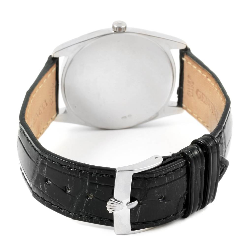 This image shows the back view of a Rolex Cellini 4233 Men's White Gold Black Dial 4233 Men's White Gold Black Dial watch, featuring its black leather strap and clasp.