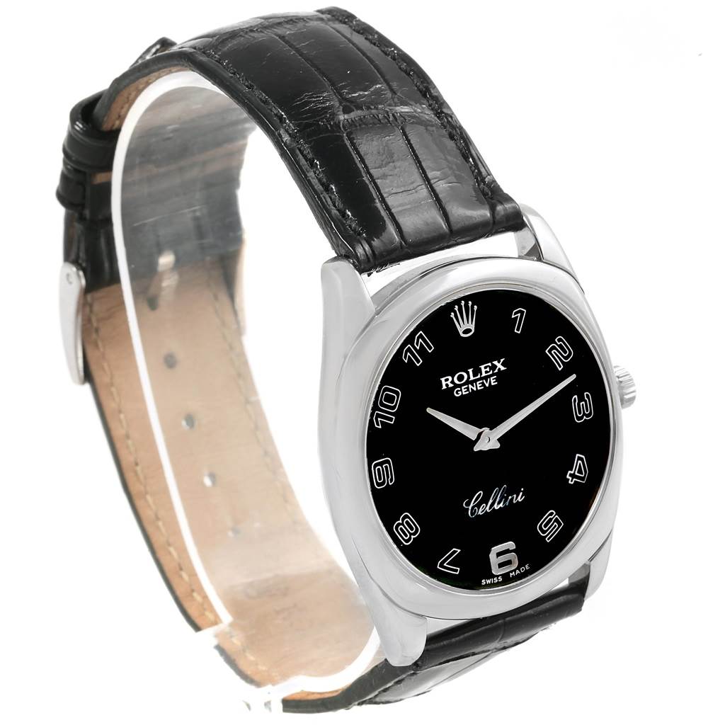 The Rolex Cellini 4233 Men's White Gold Black Dial 4233 Men's White Gold Black Dial watch is shown at an angled top view, displaying the black dial, numbers, case, and black leather strap.
