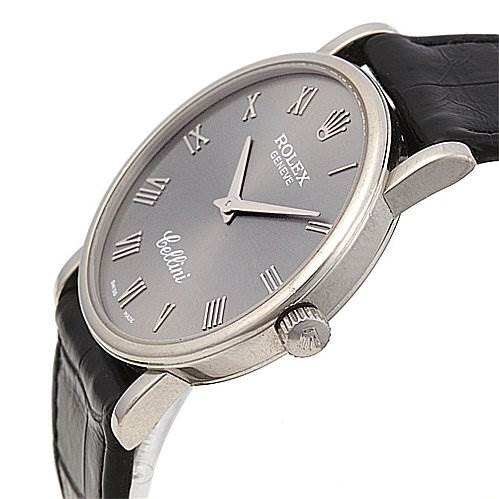 The image shows a side-angle view of a Rolex Cellini 5115/9 Men
s White Gold Grey Dial 5115/9 Men
s White Gold Grey Dial watch, highlighting its dial, crown, case, and leather strap.