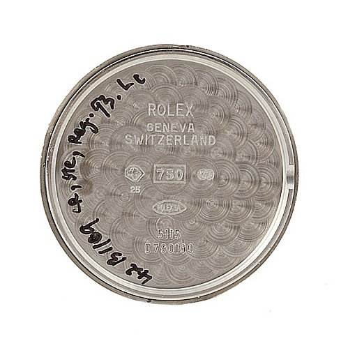 The image shows the inside case back of a Rolex Cellini 5115/9 Men
s White Gold Grey Dial 5115/9 Men
s White Gold Grey Dial model watch, featuring inscriptions and hallmarks.