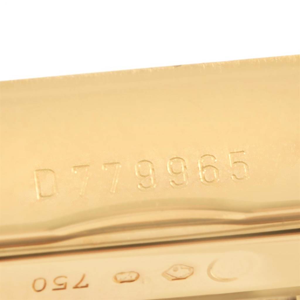 This image shows a close-up of the serial number engraving on the case back of a Rolex Cellini 5440/8 Men's Yellow Gold Champagne Dial 5440/8 Men's Yellow Gold Champagne Dial watch.