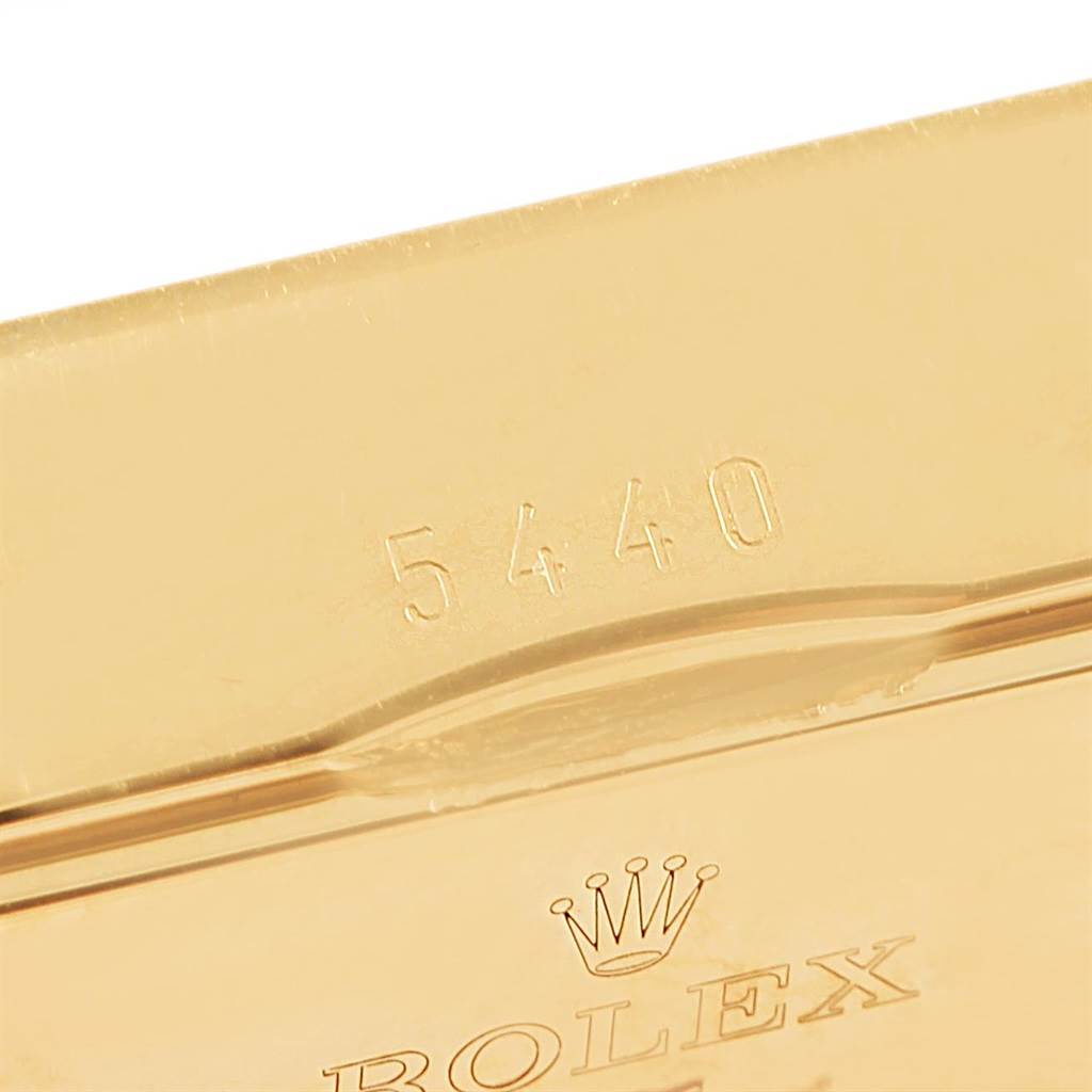 The image shows a close-up of the gold back casing of a Rolex Cellini 5440/8 Men's Yellow Gold Champagne Dial 5440/8 Men's Yellow Gold Champagne Dial watch, featuring the model number "5440".