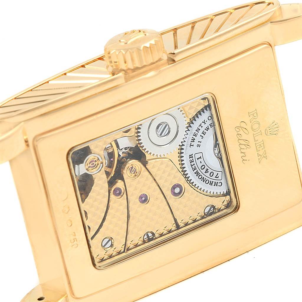 This image shows the back case and intricate inner mechanisms of the Rolex Cellini 5440/8 Men's Yellow Gold Champagne Dial 5440/8 Men's Yellow Gold Champagne Dial watch, highlighting its gears and craftsmanship.