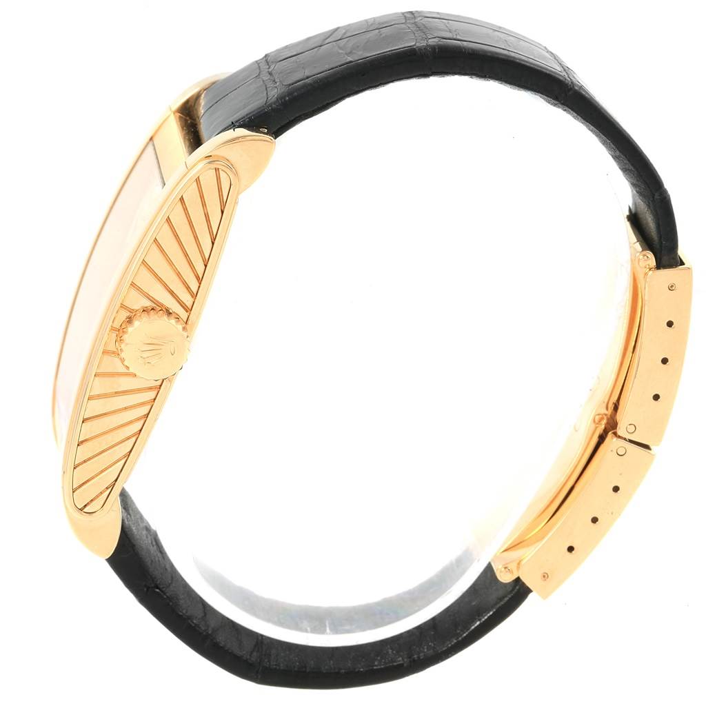 The image shows a side view of a Rolex Cellini 5440/8 Men's Yellow Gold Champagne Dial 5440/8 Men's Yellow Gold Champagne Dial watch, highlighting the crown, case, and part of the black leather strap with the clasp.