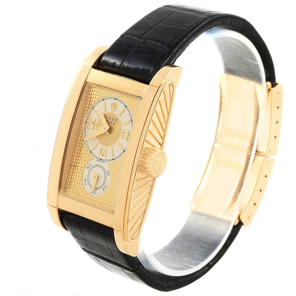The image shows a side angle of a Rolex Cellini 5440/8 Men's Yellow Gold Champagne Dial 5440/8 Men's Yellow Gold Champagne Dial watch, highlighting its gold rectangular case and black leather strap.