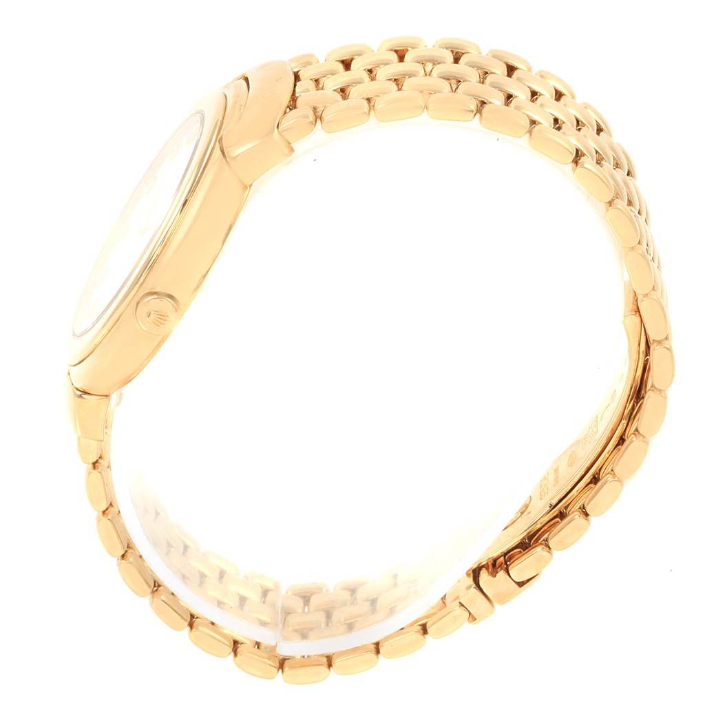 The image shows a side view of a Rolex Cellini 6622 Women
s Yellow Gold White Dial 6622 Women
s Yellow Gold White Dial watch, highlighting its case, crown, and bracelet.