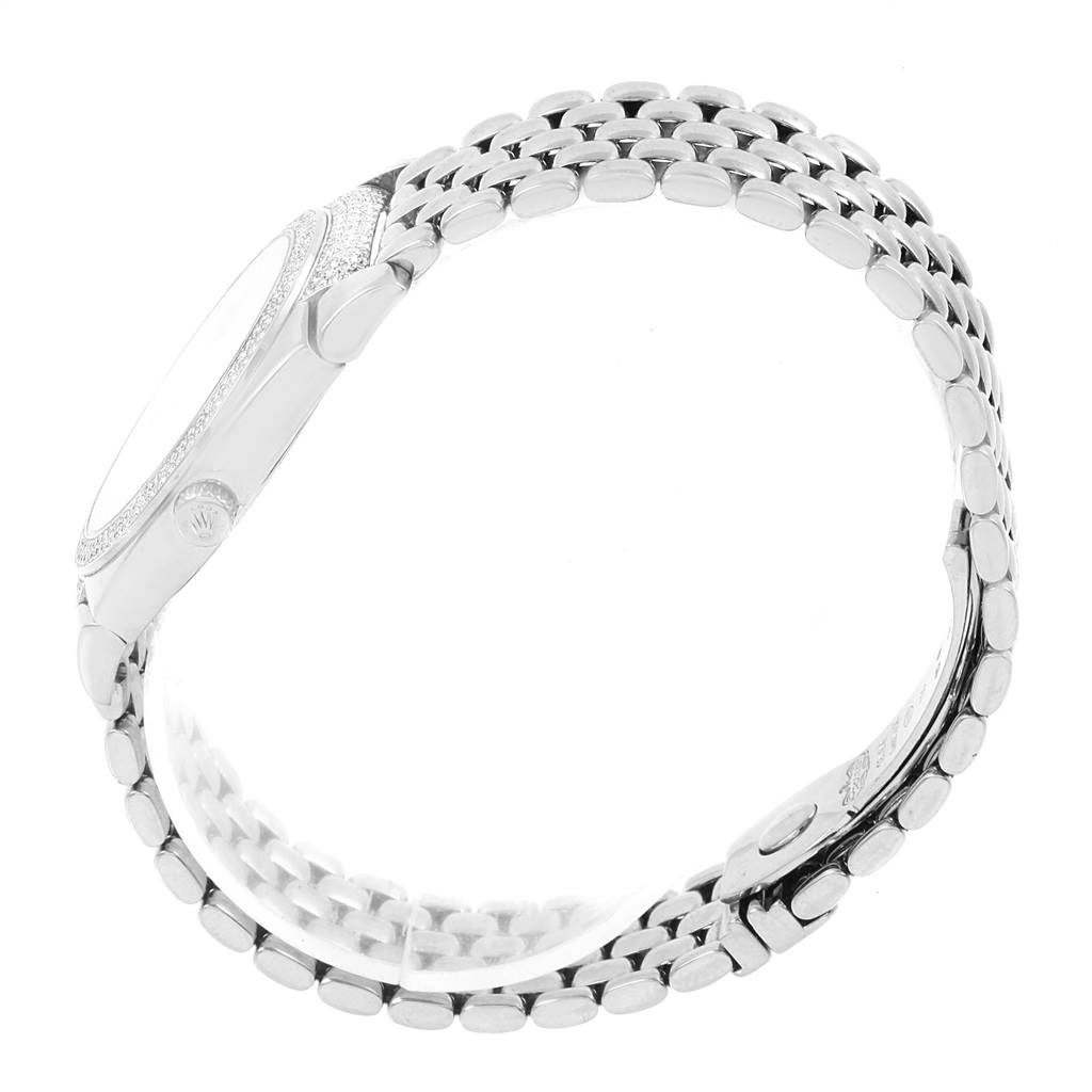 This side view of the Rolex Cellini 6321 Women's White Gold Mother of Pearl Dial 6321 Women's White Gold Mother of Pearl Dial watch shows its case, crown, and bracelet.