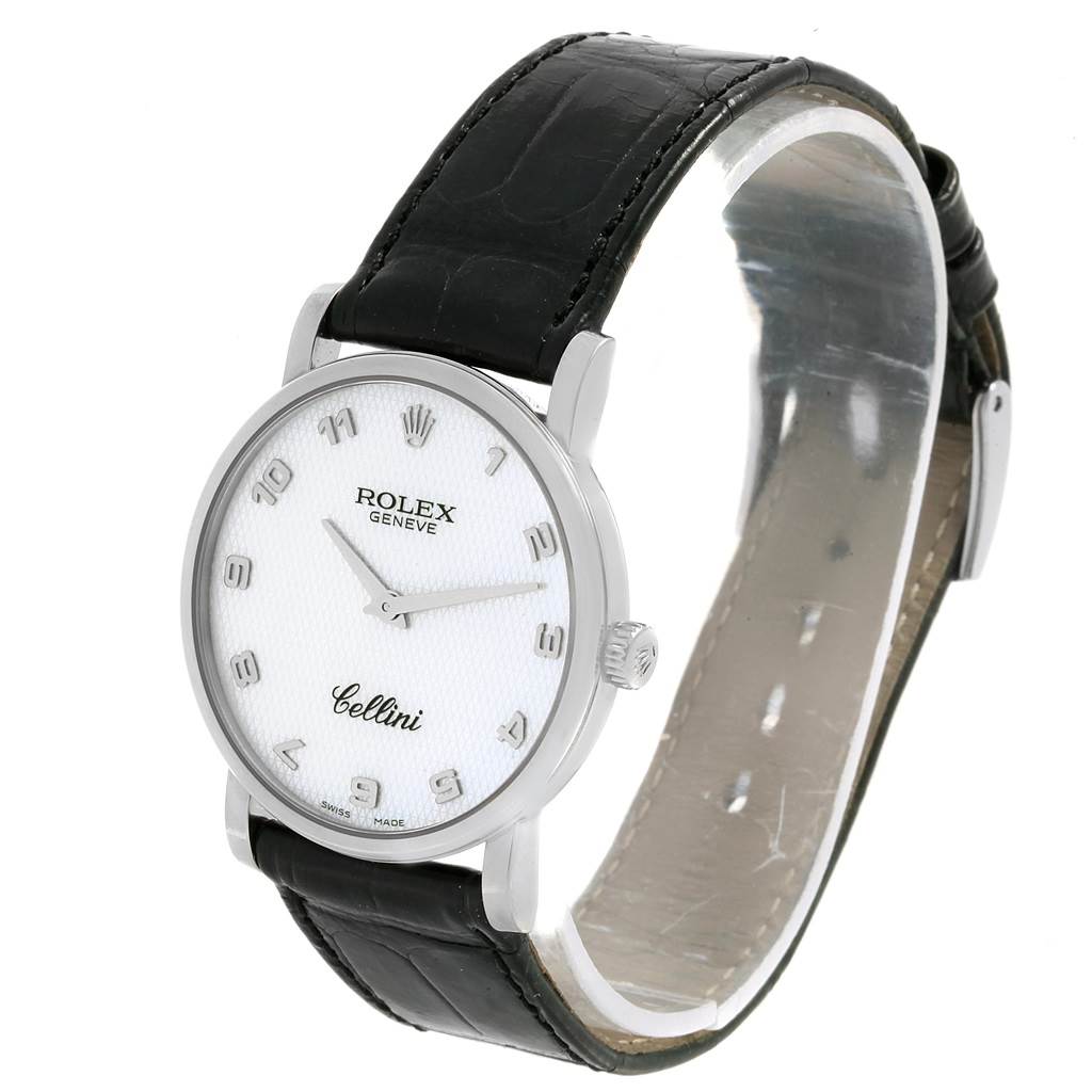 The Rolex Cellini 5115 Men's White Gold Mother of Pearl Dial 5115 Men's White Gold Mother of Pearl Dial watch is displayed at a slight side angle, showing the face, bezel, crown, and leather strap.