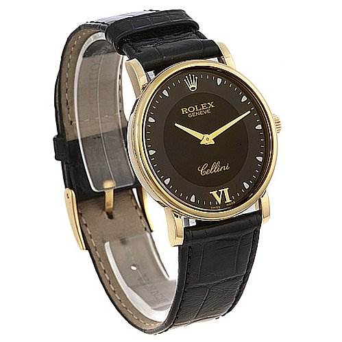 This image shows a side angle view of a Rolex Cellini 5115 Yellow Gold Black Dial 5115 Yellow Gold Black Dial watch displaying its face, dial, hands, and leather strap.