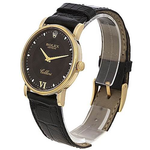 This Rolex Cellini 5115 Yellow Gold Black Dial 5115 Yellow Gold Black Dial watch is shown at a three-quarter angle, featuring its black leather strap, gold case, and black dial.