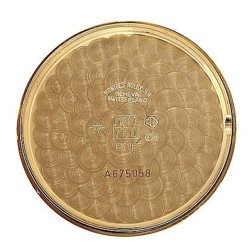 This image shows the inside of the case back of a Rolex Cellini 5115 Yellow Gold Black Dial 5115 Yellow Gold Black Dial model watch, indicating 18K gold.