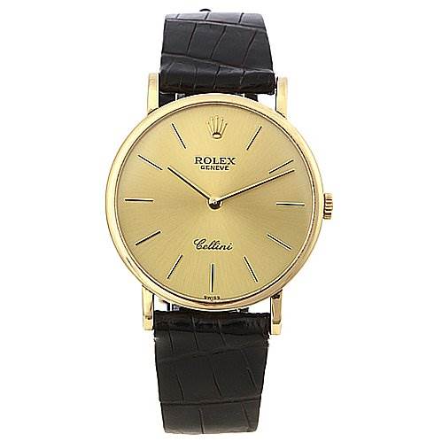 This image shows a front-facing view of a Rolex Cellini 5112 Yellow Gold Champagne Dial 5112 Yellow Gold Champagne Dial watch, highlighting its dial, hands, crown, and black leather strap.