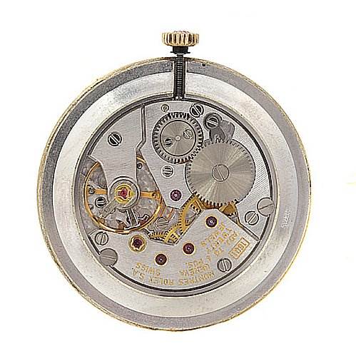 This image shows the internal mechanism and gears of a Rolex Cellini 5112 Yellow Gold Champagne Dial 5112 Yellow Gold Champagne Dial model watch from a top-down angle.